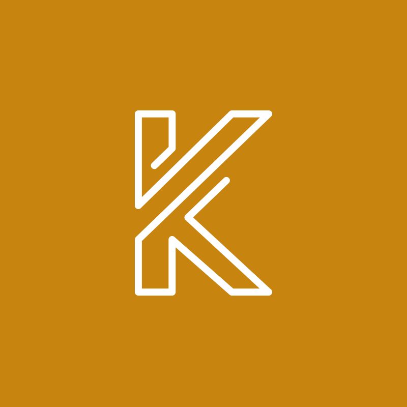 Burta K logotips baltās kontūrlīnijās uz dzeltena fona