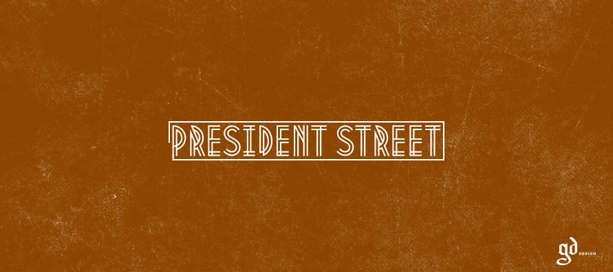 President Street uzraksts kontūrburtos uz brūna fona
